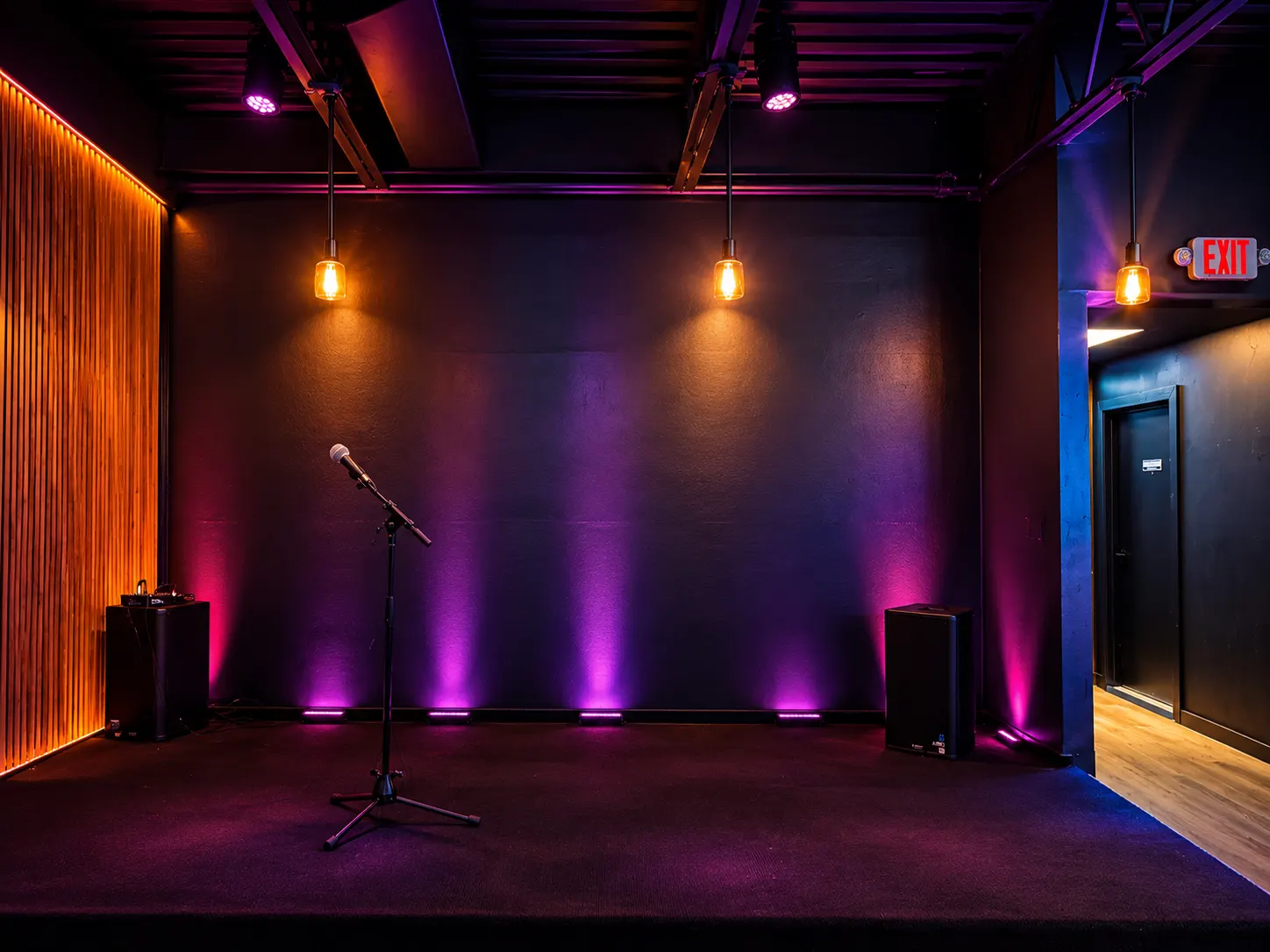 The karaoke stage at The Khukuri Restaurant Bar & Grill, a microphone under purple lights